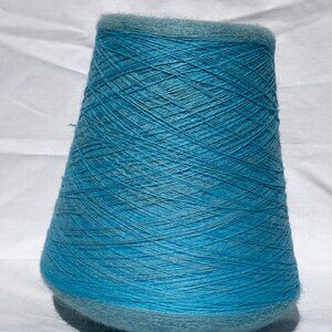turquoise light blue wool yarn cone